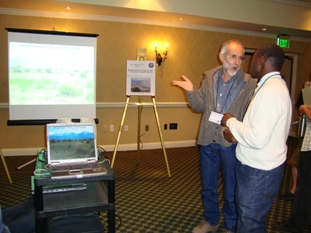 Daniel Prtichett of the California Native Plant Society explains his work at the case study presentations.