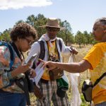 Gillian Bowser samples pollinators with students in the 3dNaturalists program during the National Park Service’s Centennial Bioblitz in Bandelier National Park, in 2016. Students worked in “pollinator hotshot teams” to identify pollinators and upload photos and information to an online database using a citizen science app called iNaturalist. Credit: Carrie Lederer