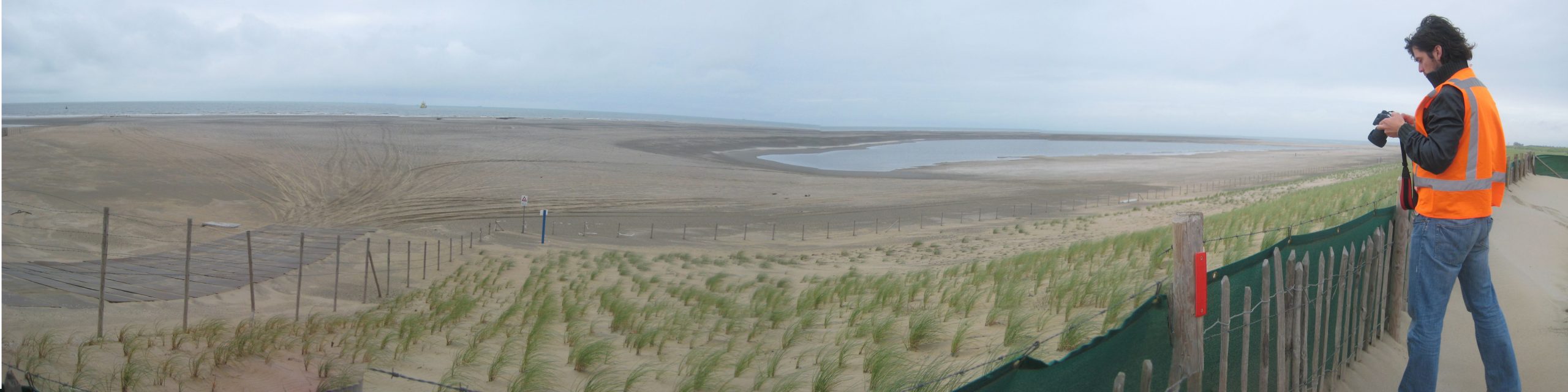 The Dutch Sand Engine experiment in dynamic coastline management is an artificial sand beach designed to erode. Sand pulled away from the 126-ha peninsula by wave, wind, and currents spreads along the Delfland Coast of The Netherlands, naturally nourishing a shoreline that has suffered rapid erosion. The project, a collaboration of government, private industry, and academic researchers, was completed in 2011 and is expected to maintain the shoreline for the next 20 years. The peninsula is also popular with wind and kite surfers. Guest editor Kristina reviews innovations in coastal infrastructure designed to work with storm surge, sea level rise, and other natural processes in “Coastal infrastructure: a typology for the next century of adaptation to sea-level rise,” on page 468 of the November Special Centennial Issue of ESA Frontiers.