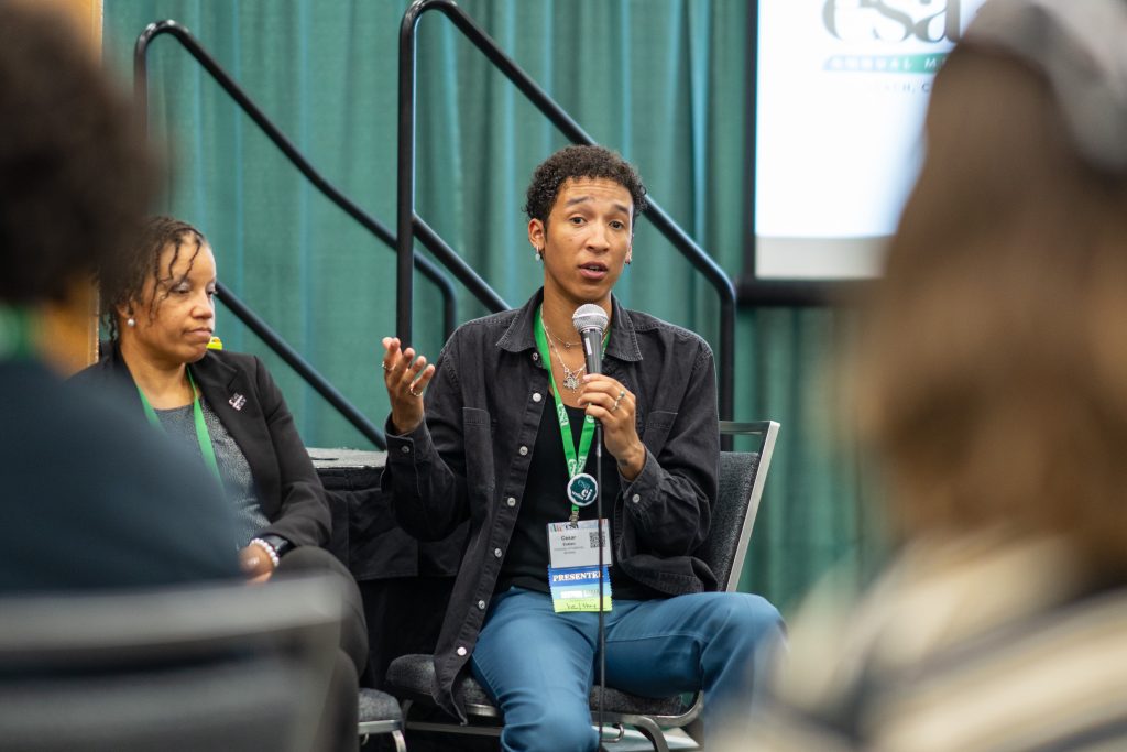 ESA leader Cesar Estien facilitating a panel on navigating the hidden curriculum at the 2023 ESA Annual Meeting