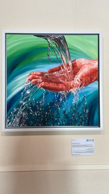 Painting: Hands collecting water.