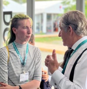 ESA Delegate Claire Bandet speaking with Tony Juniper at the COP16 conference, October 30, 2024.